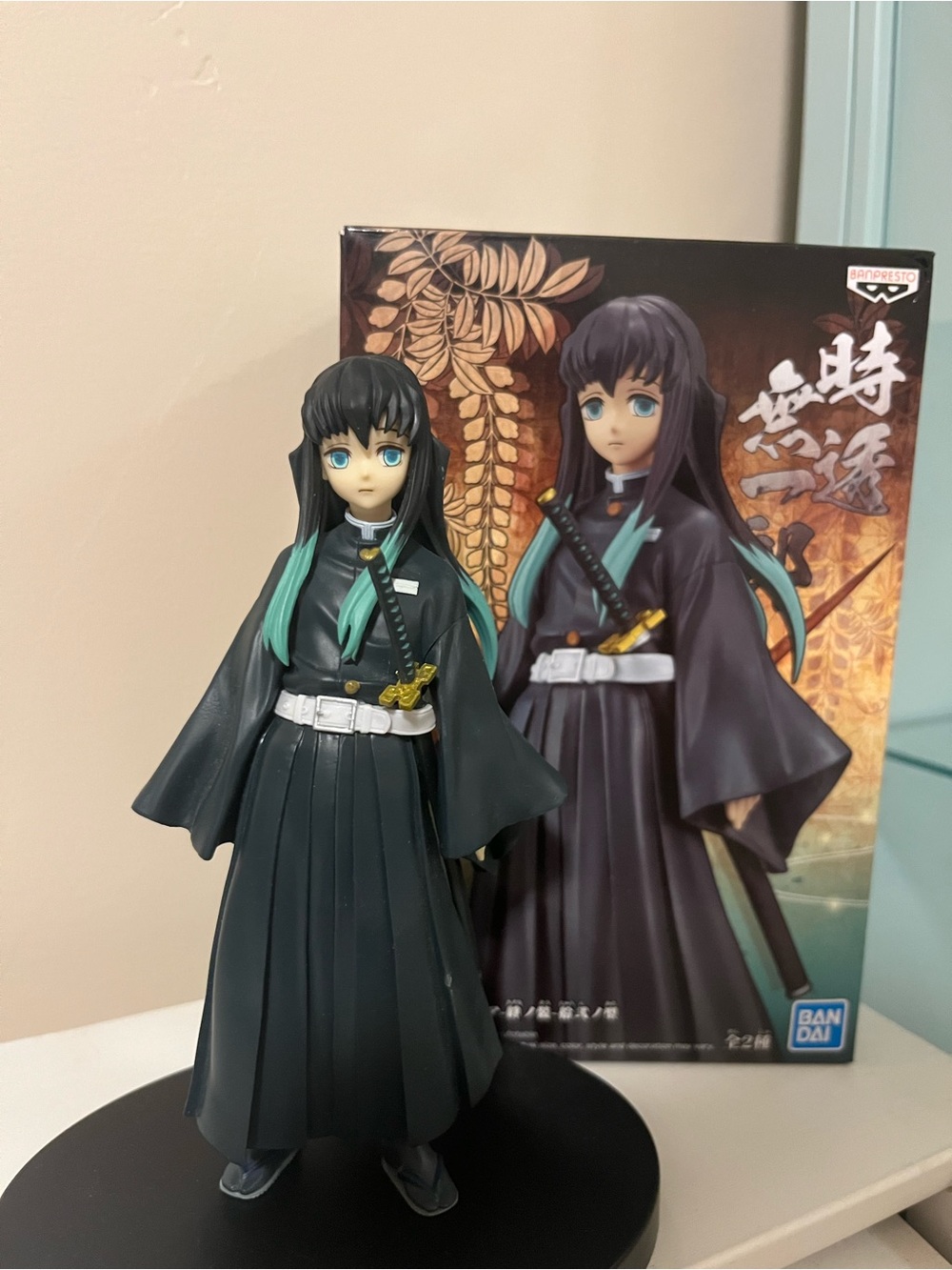 Black and Teal Anime Figurine - Female Character